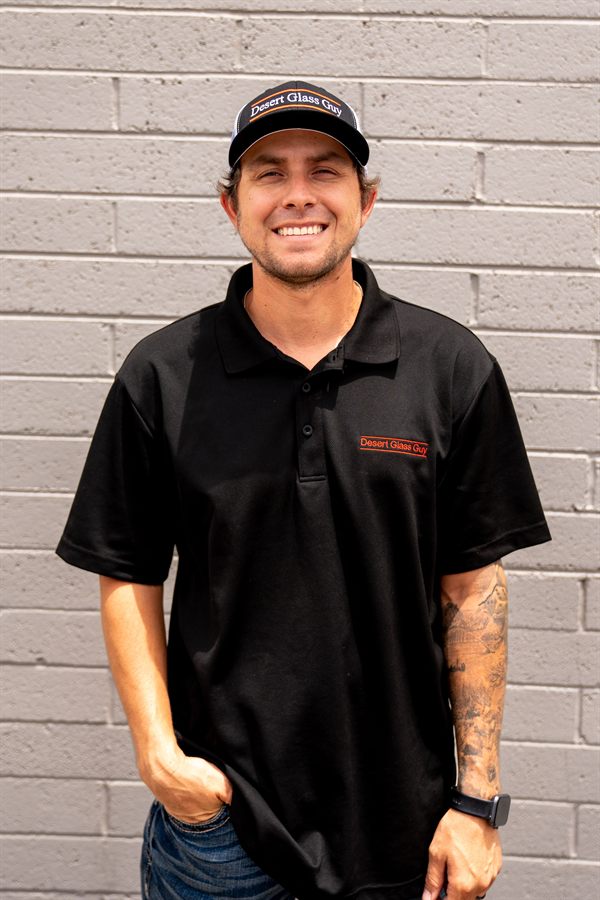 Cody in a Desert Glass Guy polo and cap