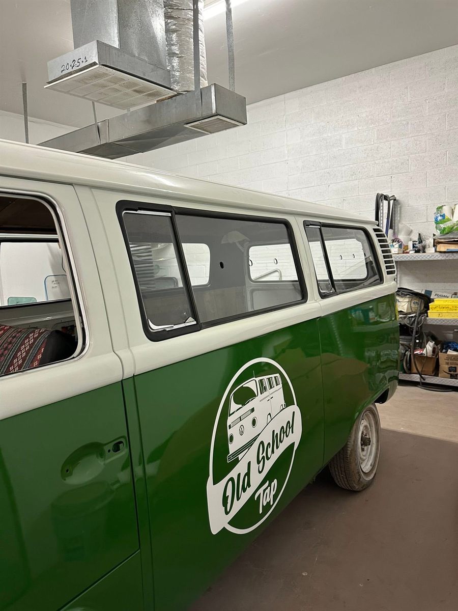 Vintage VW bus with custom cut glass installed